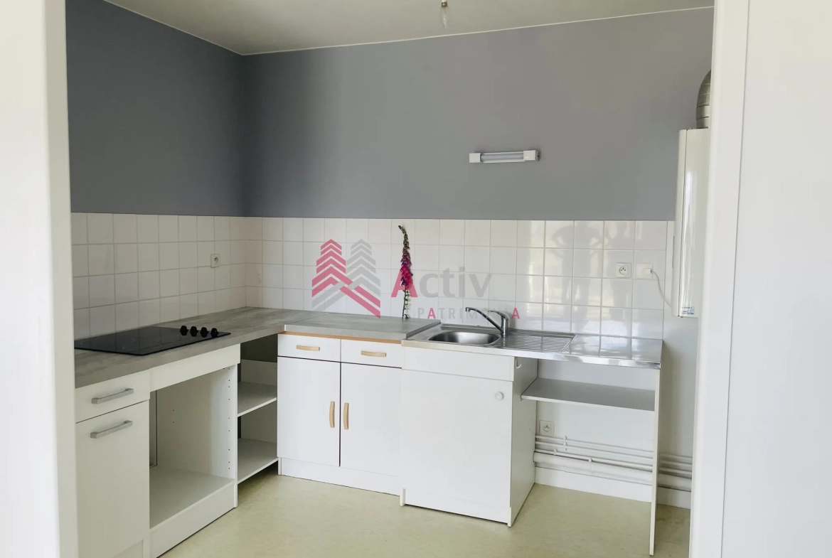 Appartement T2 à vendre à Plancoet avec balcon, cave et garage - résidence sécurisée 
