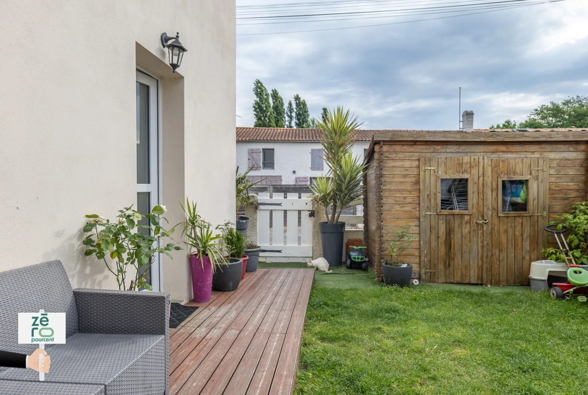 Maison familiale de 82 m² à Bouguenais avec jardin et proximité commodités 
