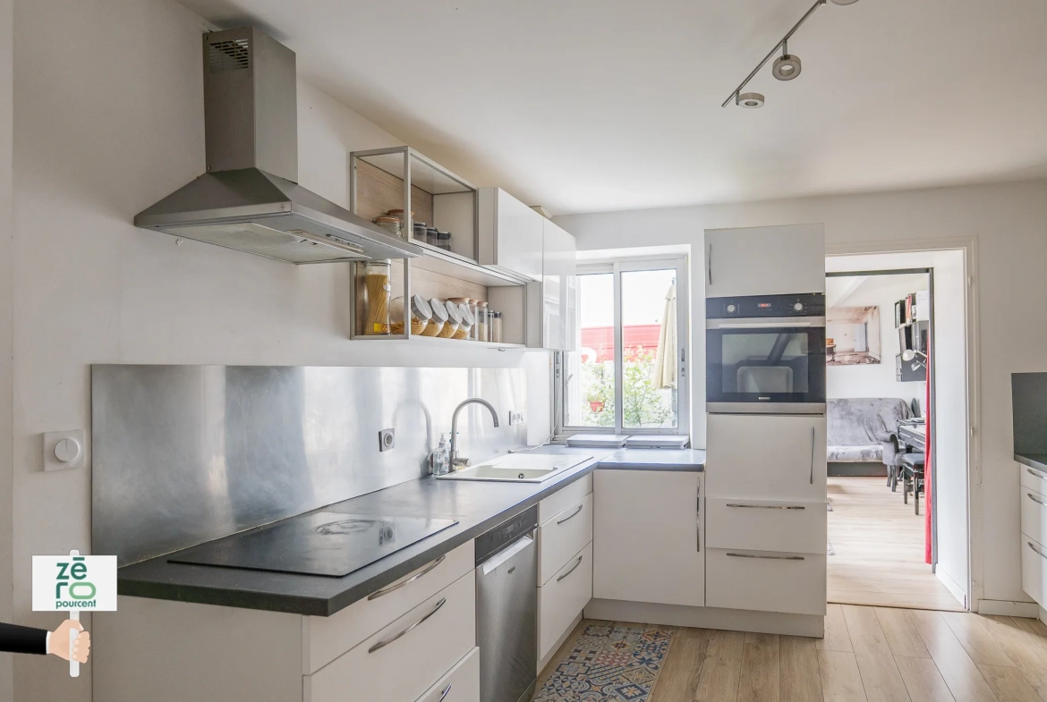Maison familiale de 82 m² à Bouguenais avec jardin et proximité commodités 