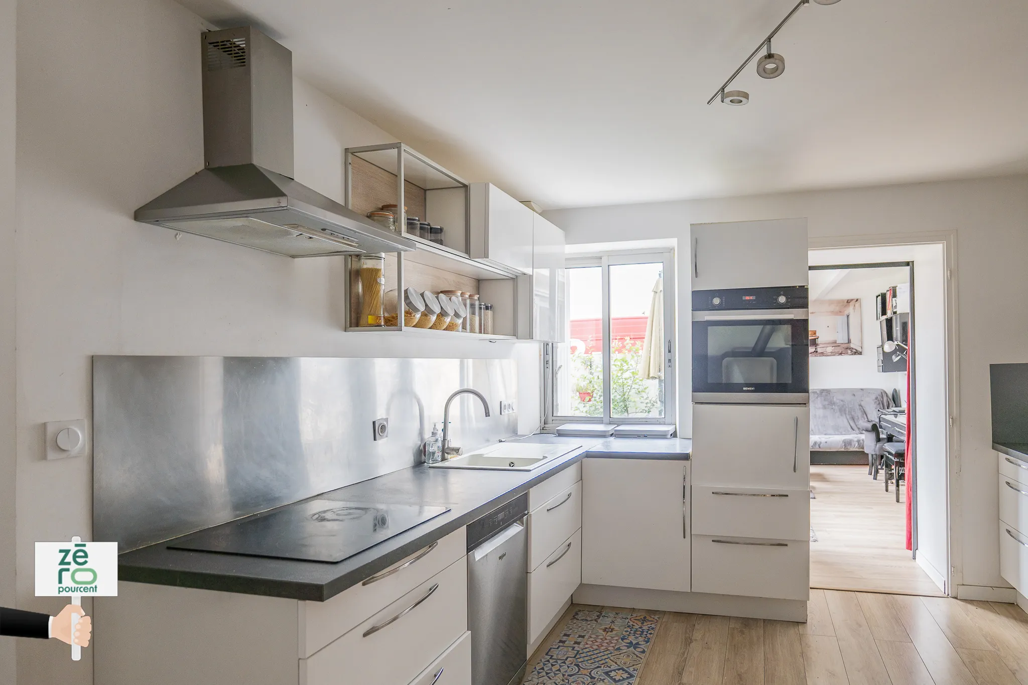 Maison familiale de 82 m² à Bouguenais avec jardin et proximité commodités 
