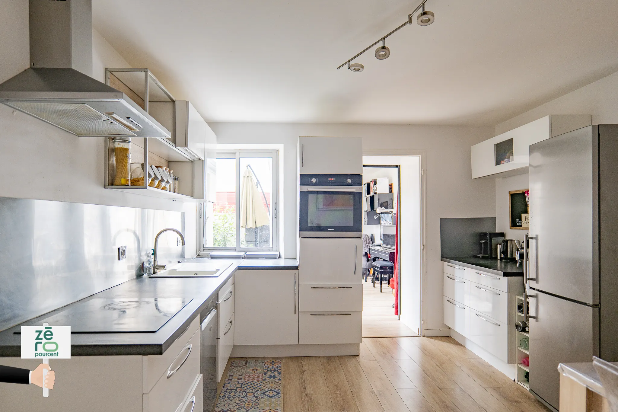 Maison familiale de 82 m² à Bouguenais avec jardin et proximité commodités 