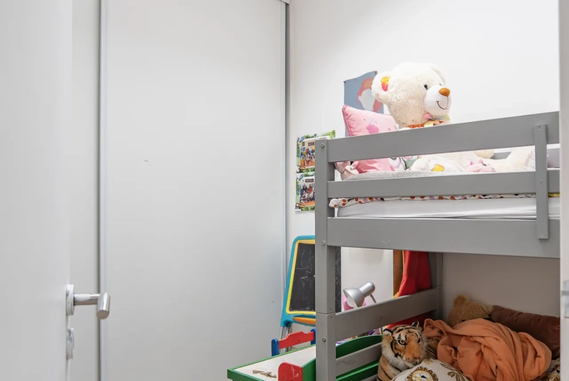 Maison familiale de 82 m² à Bouguenais avec jardin et proximité commodités 