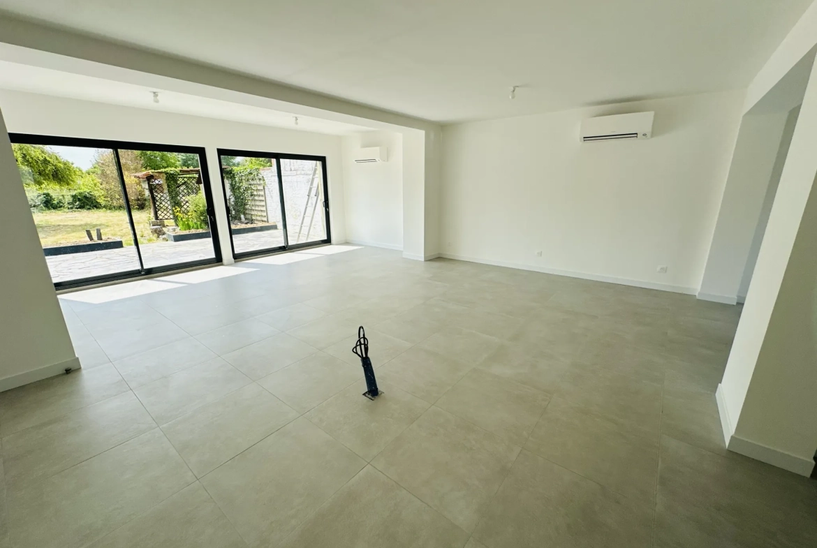 Maison rénovée avec 3 chambres, jardin et garage à Flers-en-Escrebieux 