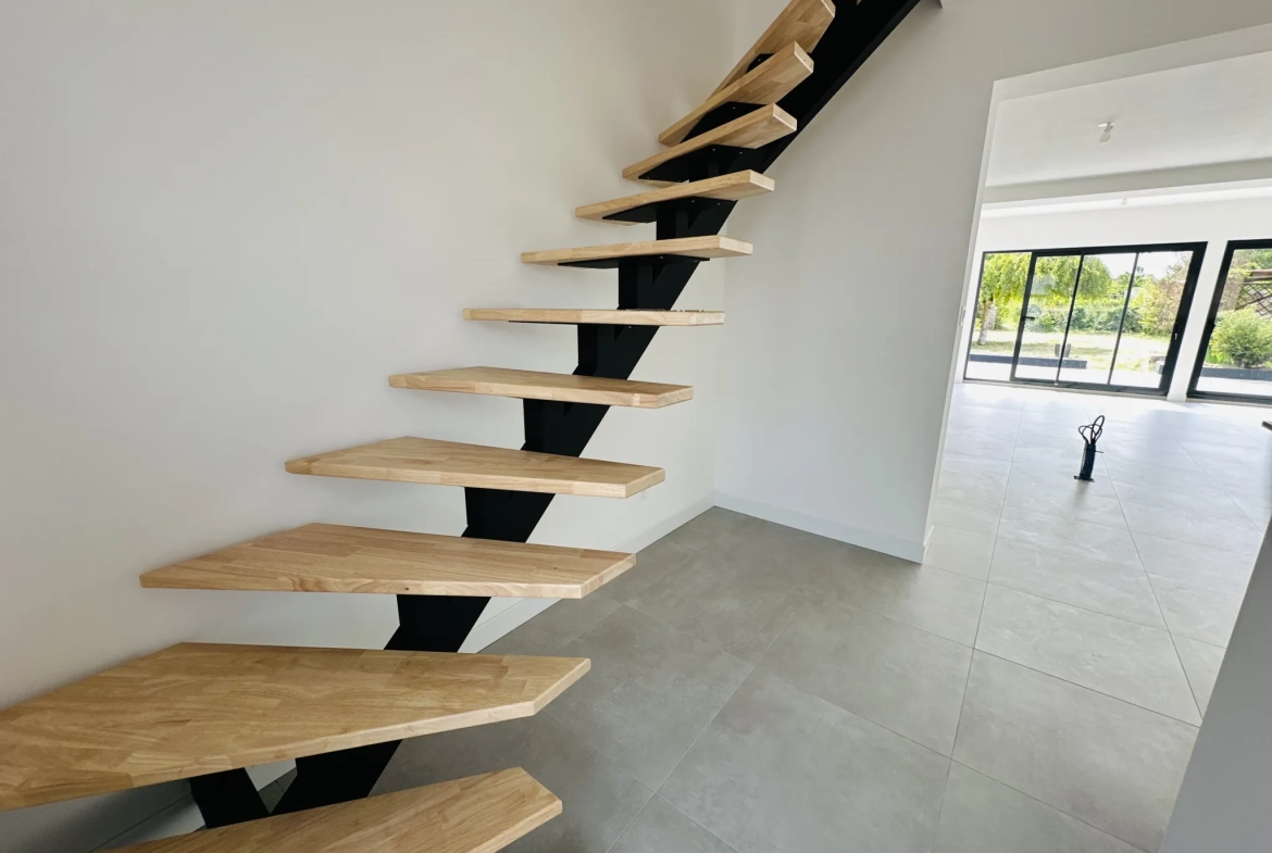 Maison rénovée avec 3 chambres, jardin et garage à Flers-en-Escrebieux 