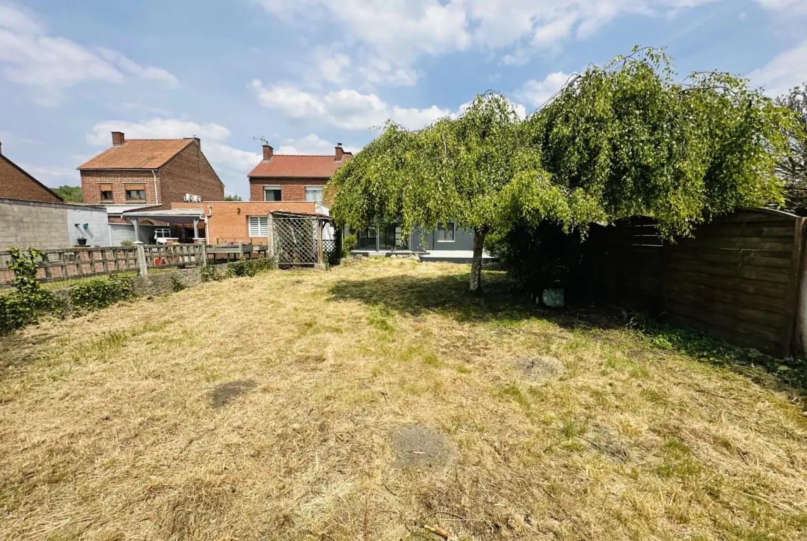 Maison rénovée avec 3 chambres, jardin et garage à Flers-en-Escrebieux 