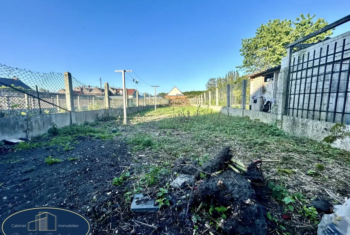 Maison mitoyenne à Aniche avec jardin et 2 chambres, possibilité d'en faire 3 
