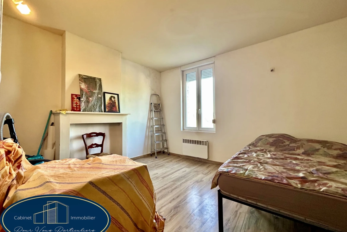 Maison mitoyenne à Aniche avec jardin et 2 chambres, possibilité d'en faire 3 