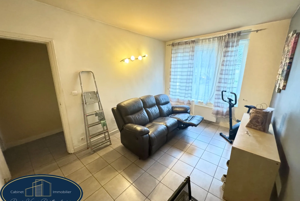 Maison mitoyenne à Aniche avec jardin et 2 chambres, possibilité d'en faire 3 
