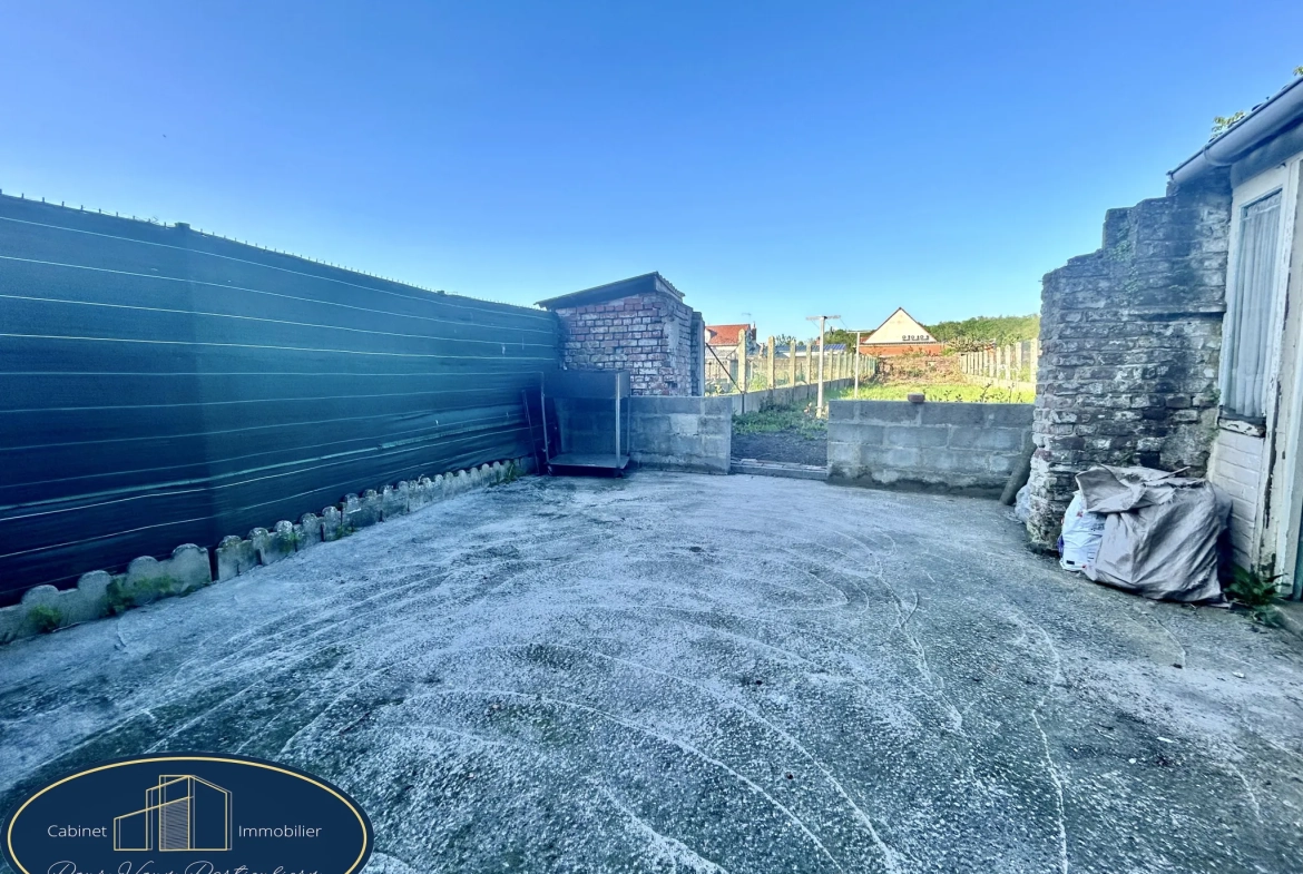 Maison mitoyenne à Aniche avec jardin et 2 chambres, possibilité d'en faire 3 