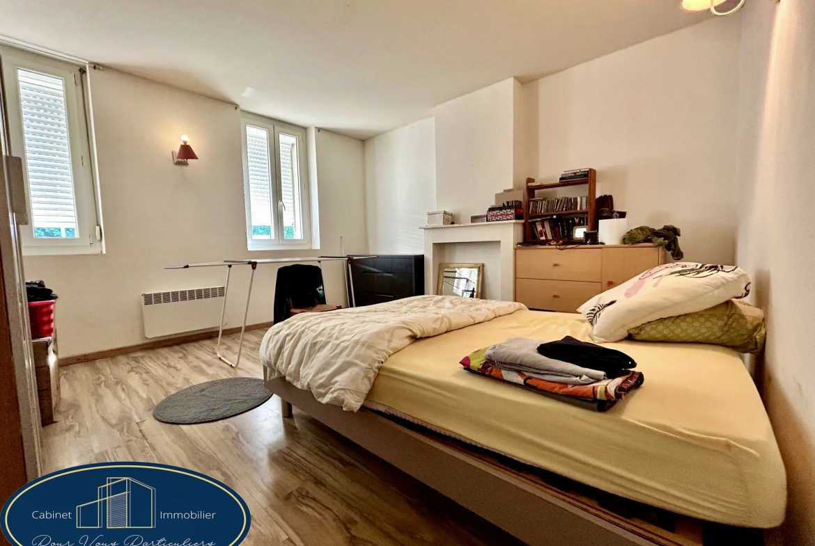 Maison mitoyenne à Aniche avec jardin et 2 chambres, possibilité d'en faire 3 