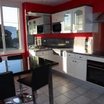 Maison bifamiliale en vente à Autun avec grand terrain et garage