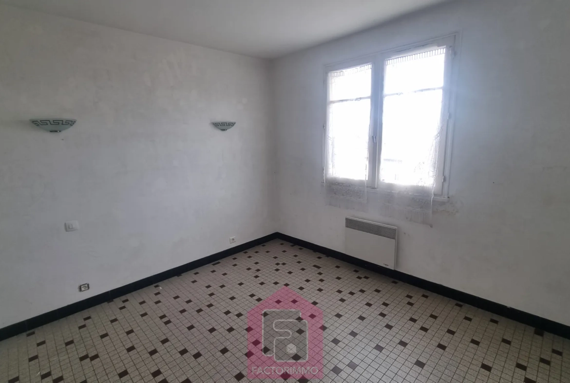 Maison à vendre à Puy l'Évêque avec garage et jardin - Potentiel d'extension 