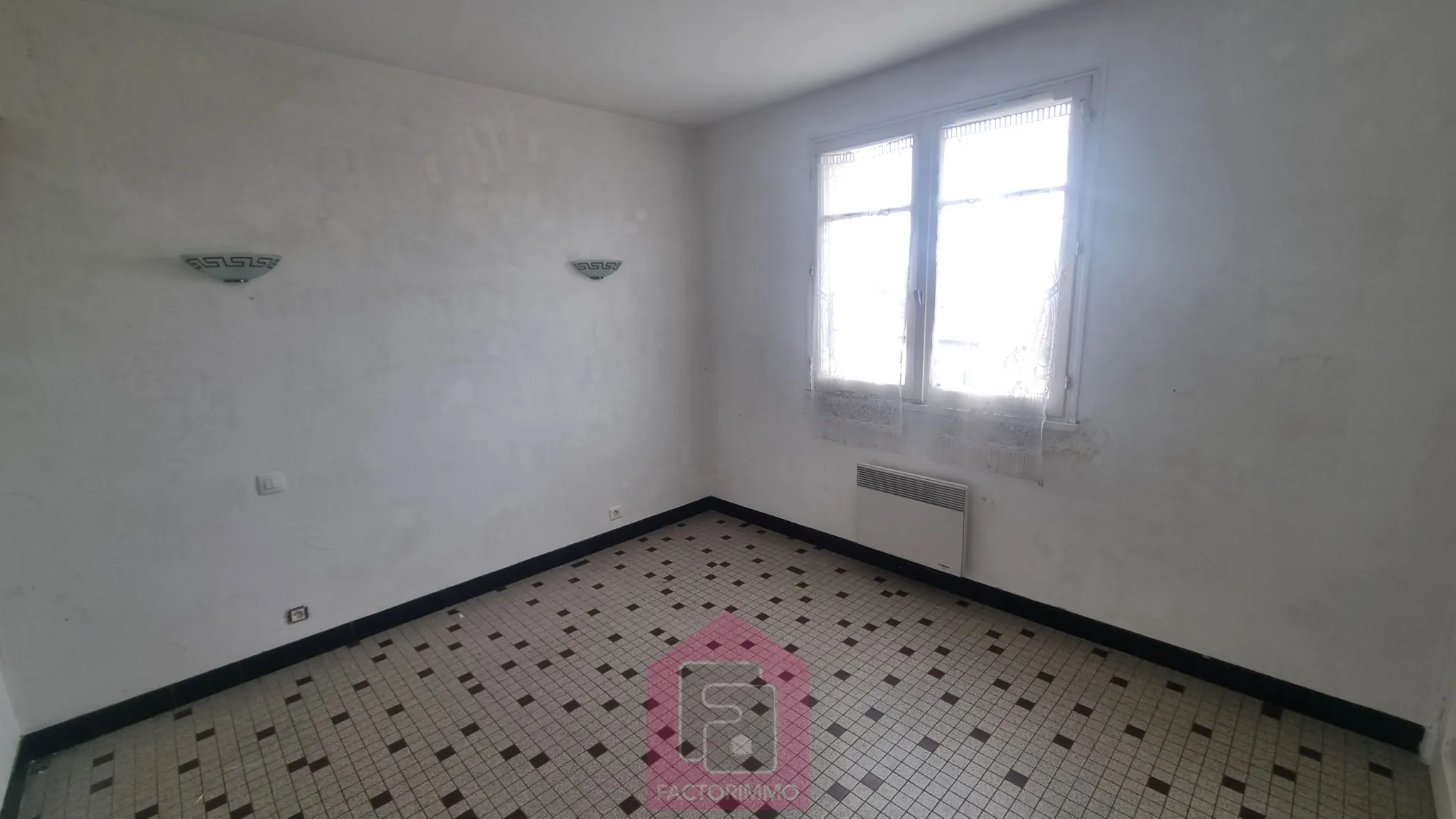 Maison à vendre à Puy l'Évêque avec garage et jardin - Potentiel d'extension 
