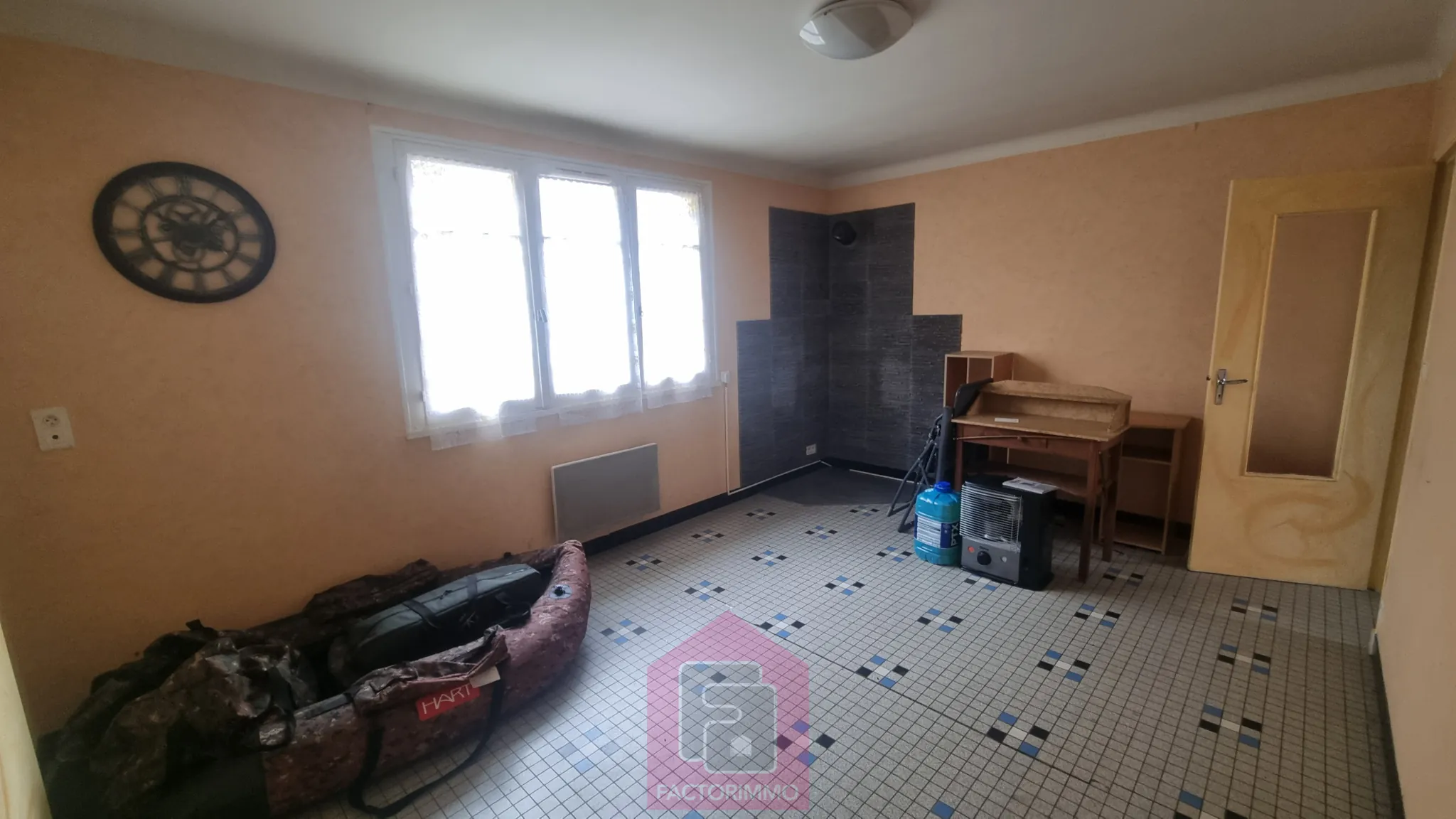 Maison à vendre à Puy l'Évêque avec garage et jardin - Potentiel d'extension 