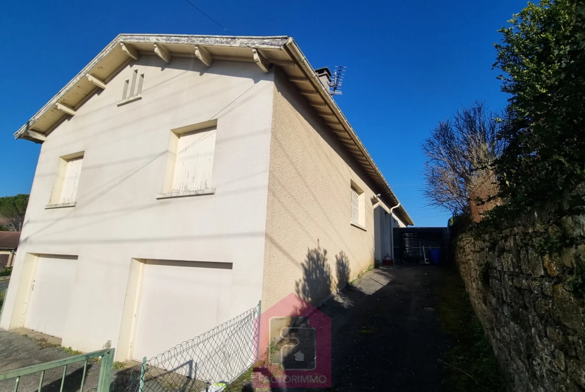 Maison à vendre à Puy l'Évêque avec garage et jardin - Potentiel d'extension 