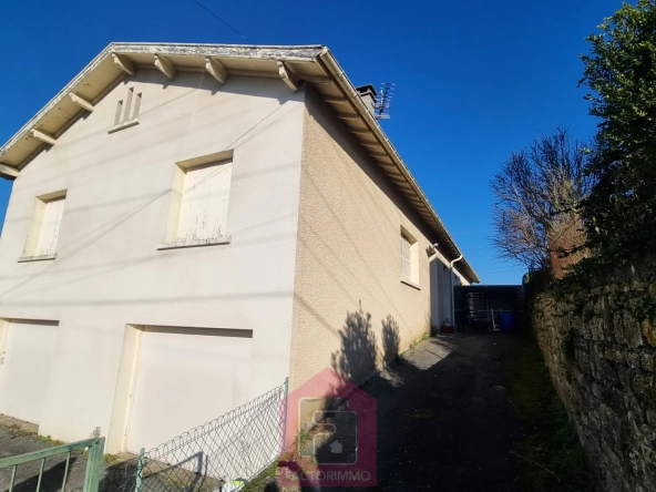 Maison à vendre à Puy l'Évêque avec garage et jardin - Potentiel d'extension