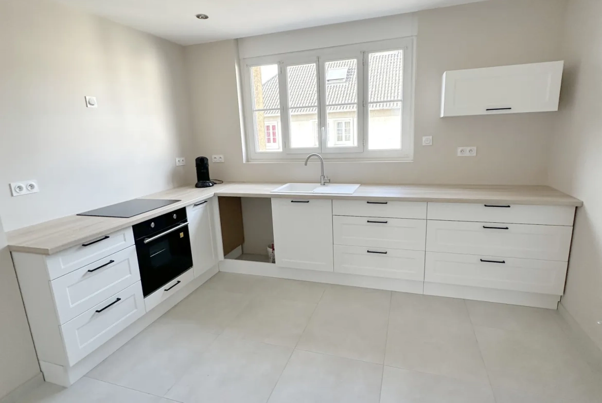 Bel appartement de 96 m² avec garage et emplacement privilégié à La Chapelle Saint-Luc 