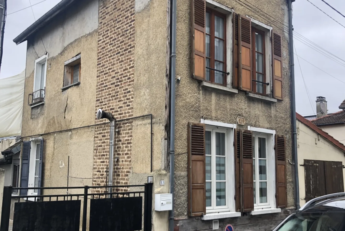 Maison de caractère de 87m² avec jardin et garage à Troyes proche centre-ville 