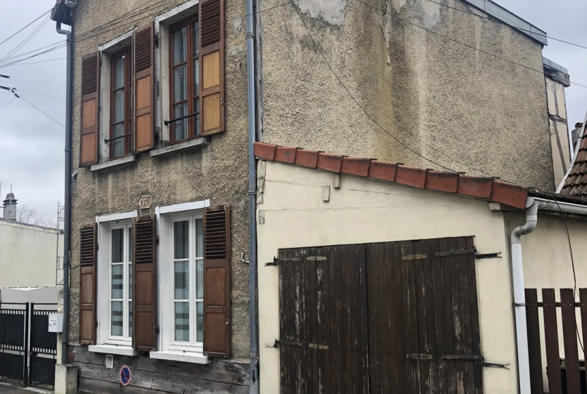 Maison de caractère de 87m² avec jardin et garage à Troyes proche centre-ville 