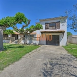Villa à Gallician de 110 m² avec grand garage, terrain arboré, et potentiel de rénovation