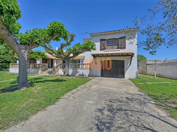 Villa à Gallician de 110 m² avec grand garage, terrain arboré, et potentiel de rénovation
