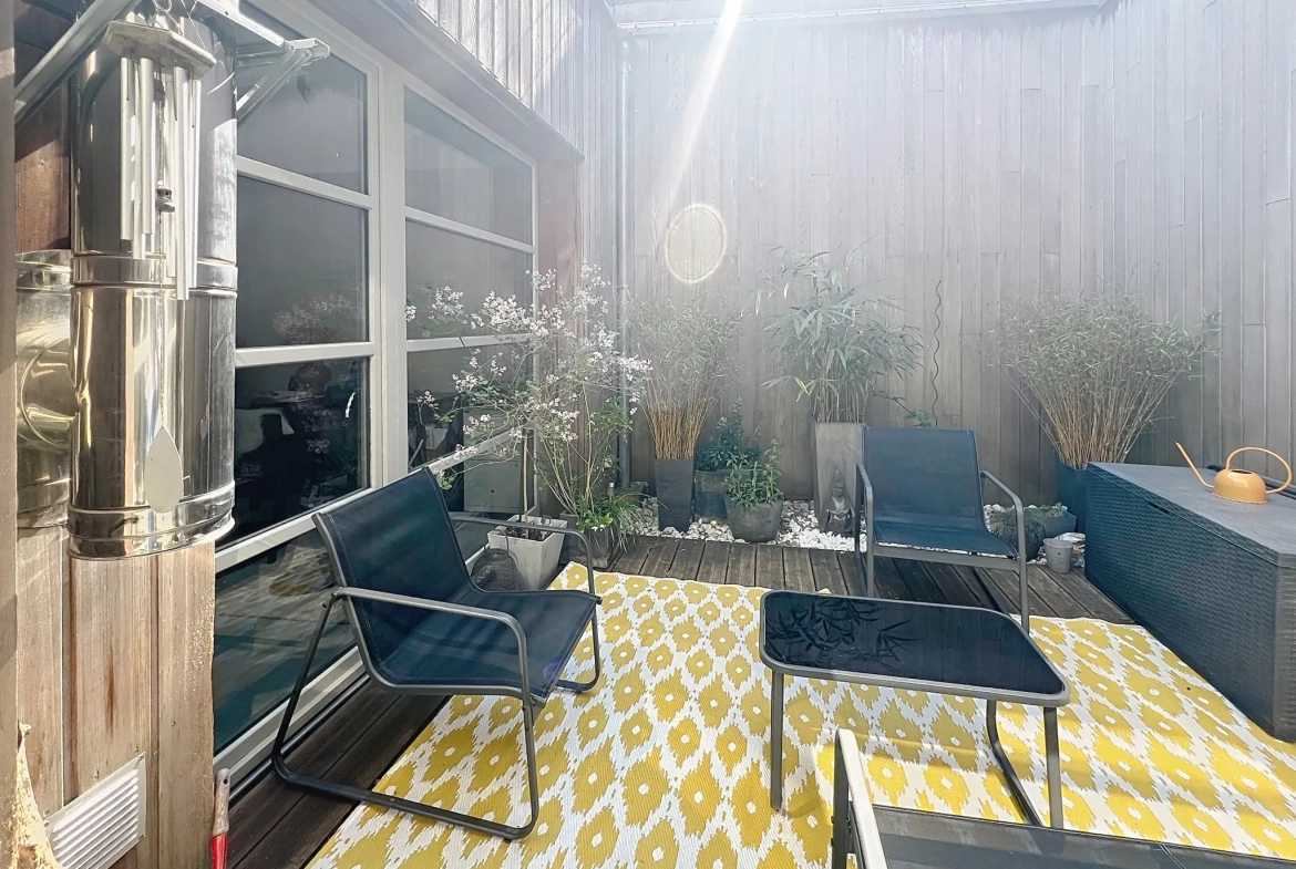 Loft à vendre à Tourcoing avec 2 chambres, terrasse et parking - Emplacement idéal 