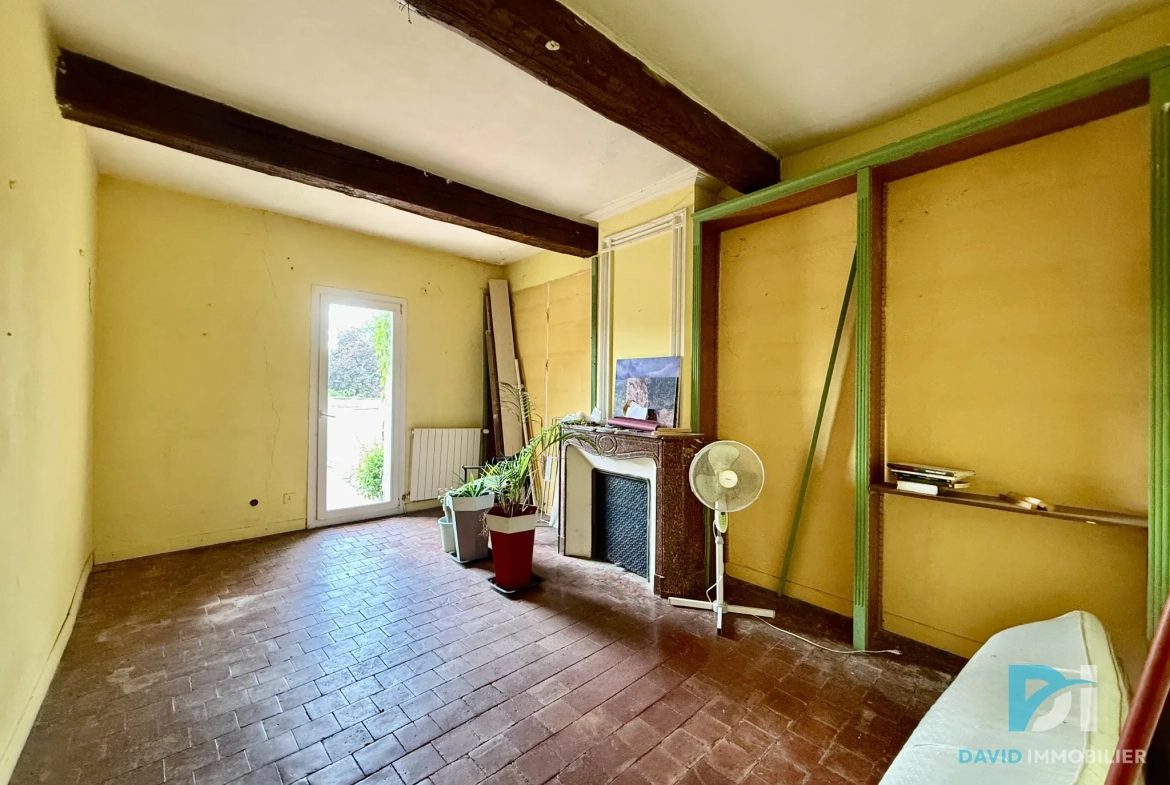Maison vigneronne à Saint-Thibéry avec garage, terrasses et potentiel d’aménagement 