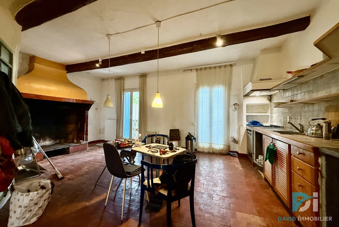 Maison vigneronne à Saint-Thibéry avec garage, terrasses et potentiel d’aménagement 