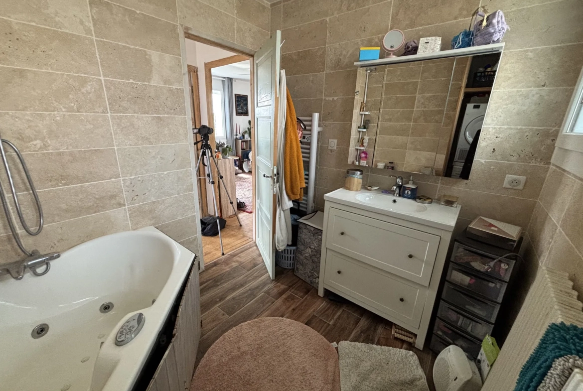 Maison de plain-pied à Tulle avec studio, jardin et potentiel de rénovation 