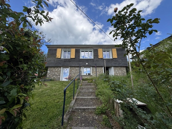 Maison de plain-pied à Tulle avec studio, jardin et potentiel de rénovation