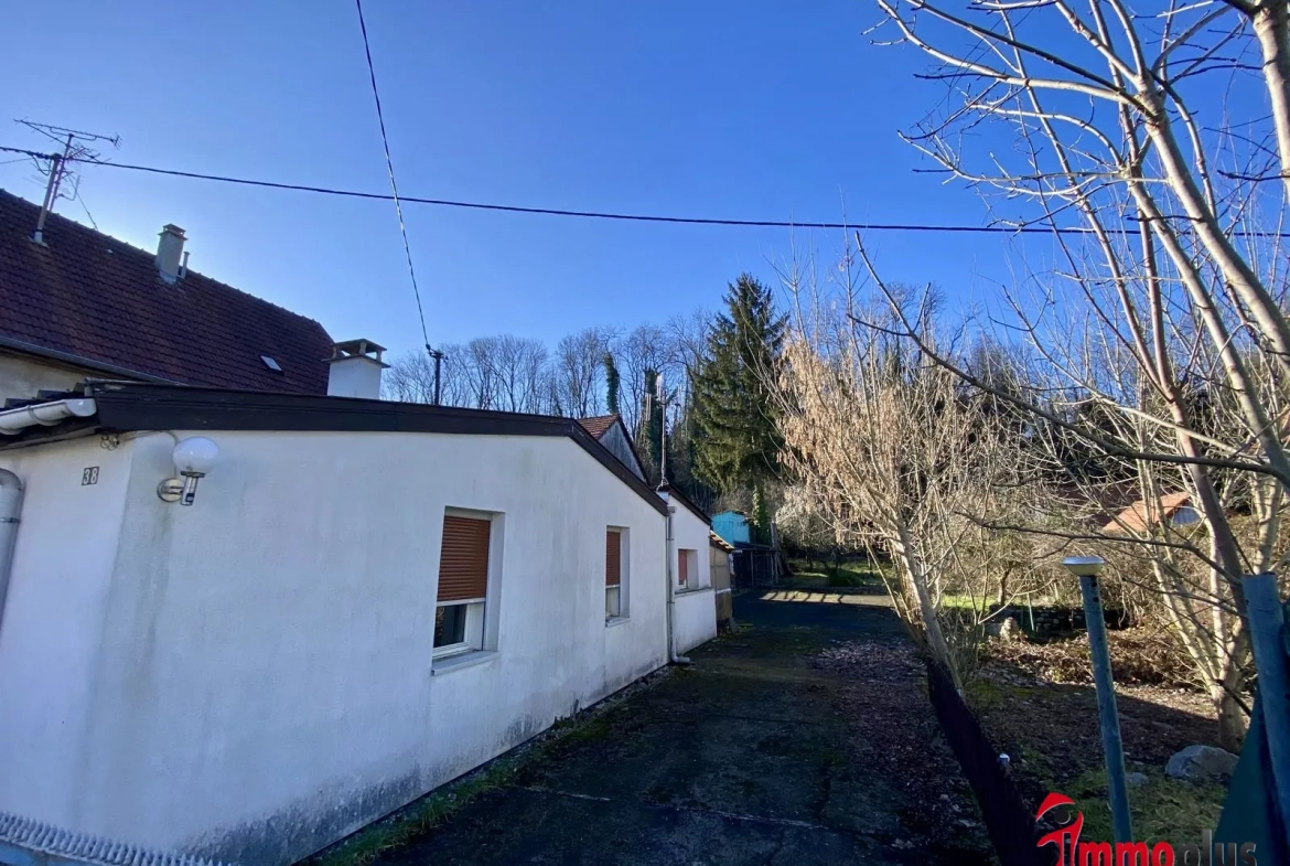 Maison de 65 m² avec terrain divisible à Bartenheim, environnement paisible et potentiel de construction 