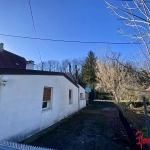 Maison de 65 m² avec terrain divisible à Bartenheim, environnement paisible et potentiel de construction