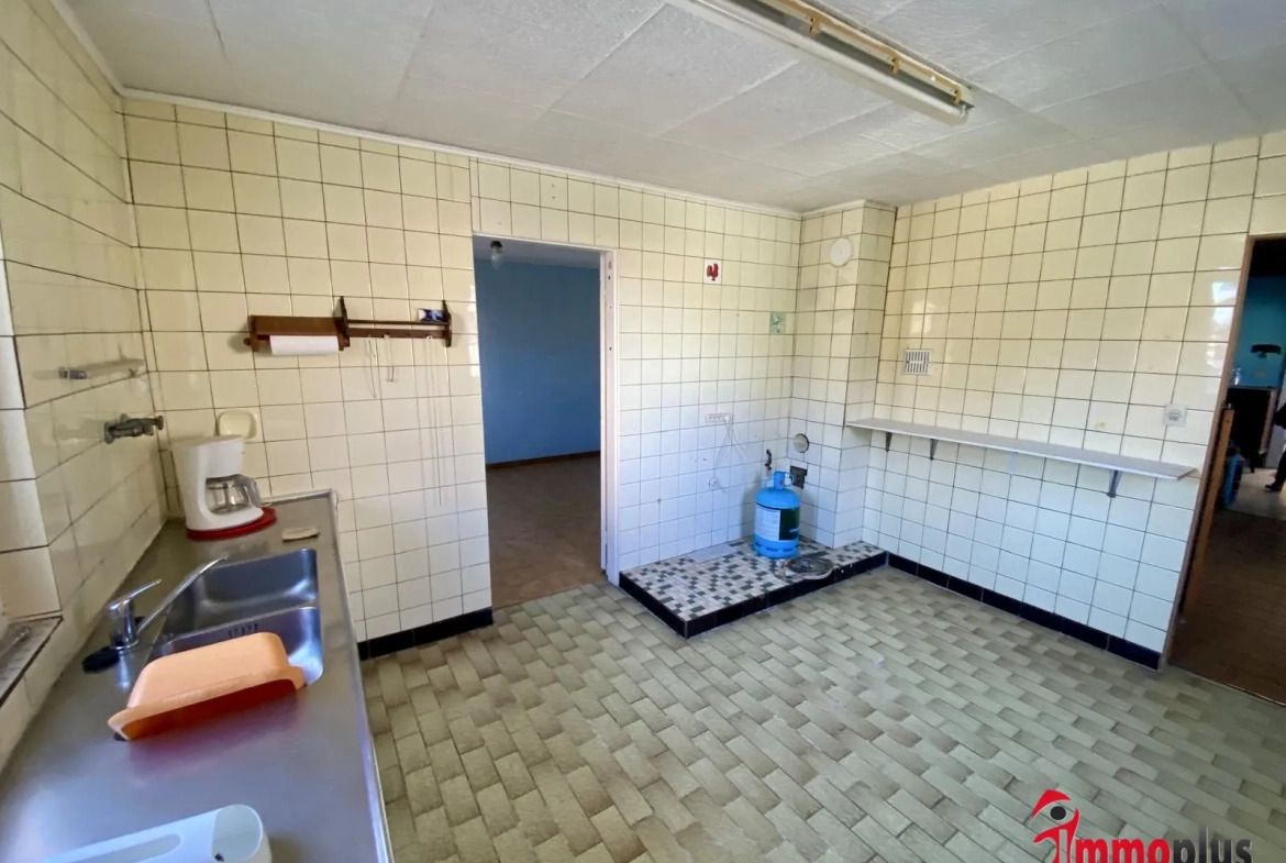 Maison de 65 m² avec terrain divisible à Bartenheim, environnement paisible et potentiel de construction 