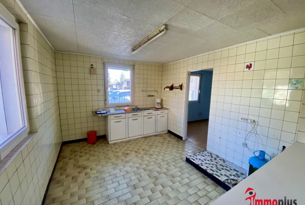 Maison de 65 m² avec terrain divisible à Bartenheim, environnement paisible et potentiel de construction 