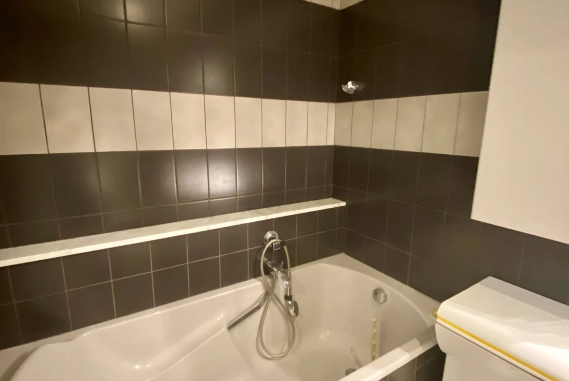 Appartement d’exception à Maubeuge avec 3 chambres, balcon et garage 