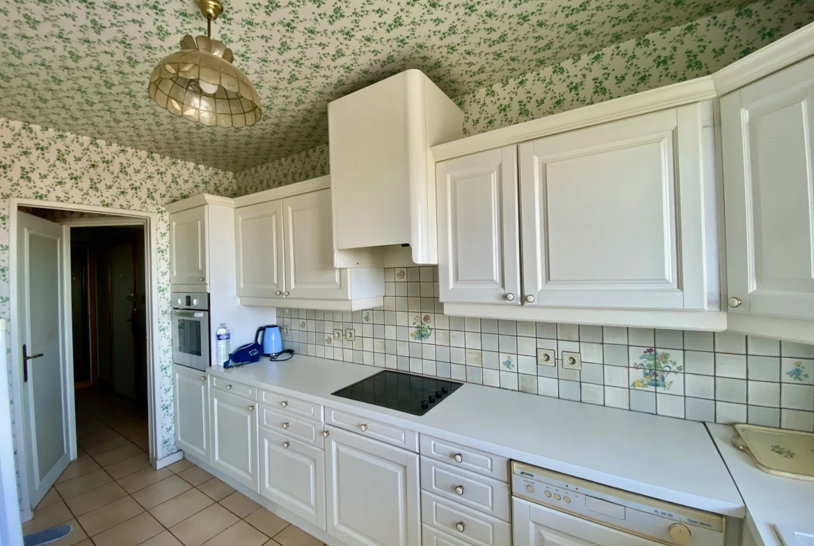 Appartement d’exception à Maubeuge avec 3 chambres, balcon et garage 