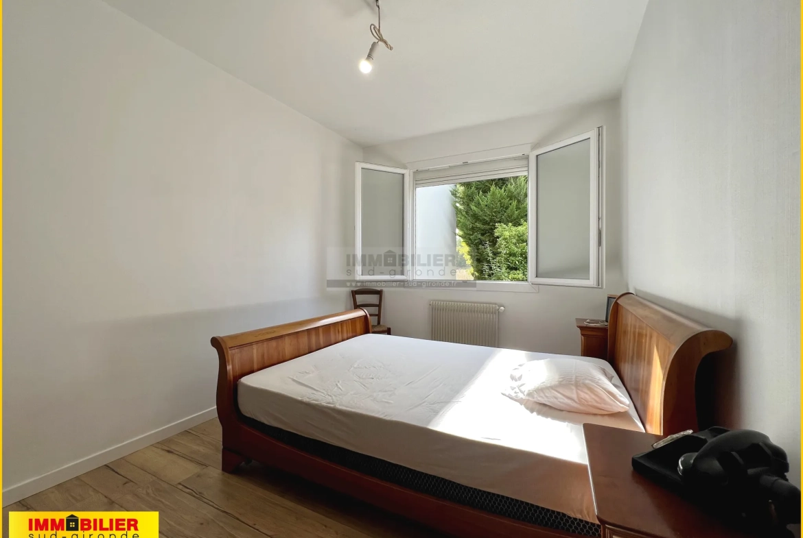 Charmante maison familiale à Landiras avec grand jardin et garage, proche centre 