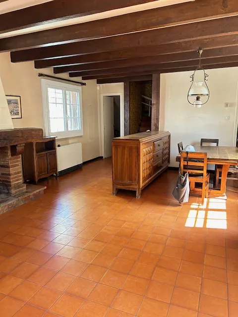 Opportunité immobilière à Leguevin : 2 maisons, garages et terrains à rénover 