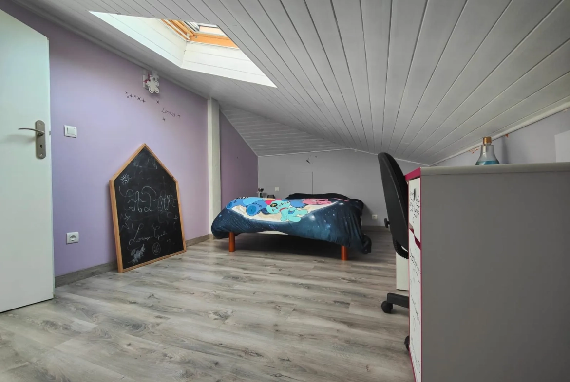 Maison de plain-pied avec garage et jardin à La Réole – 120 m² 