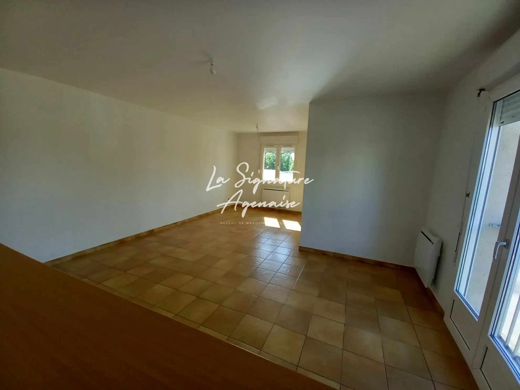 Appartement T2 avec garage au Passage, 58 m², proche commodités 