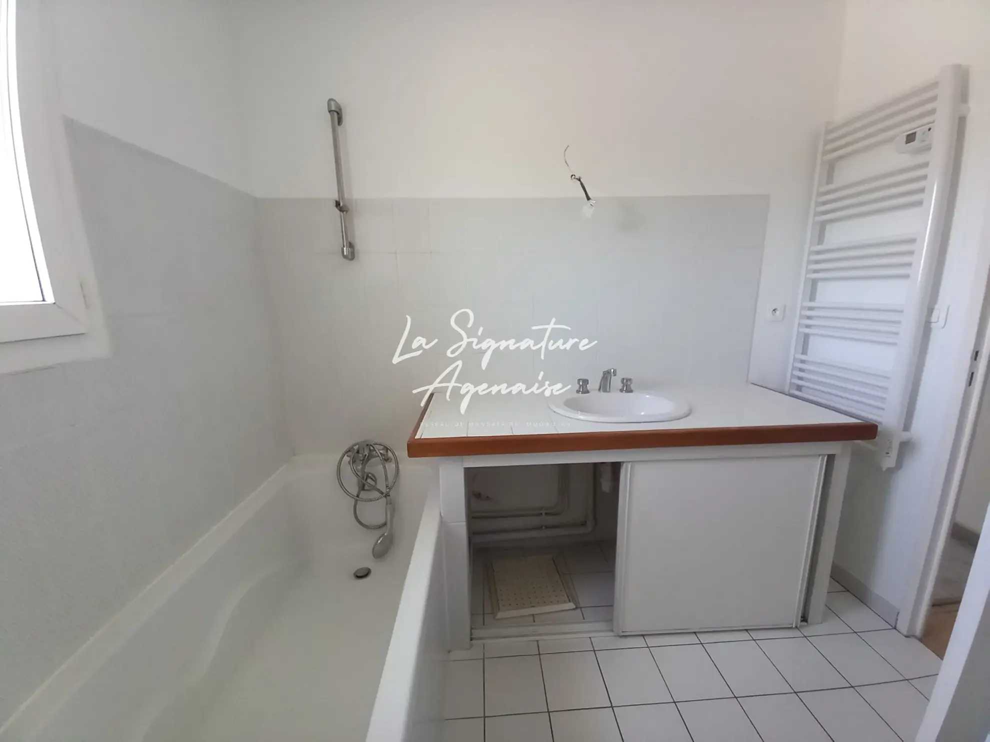 Appartement T2 avec garage au Passage, 58 m², proche commodités 