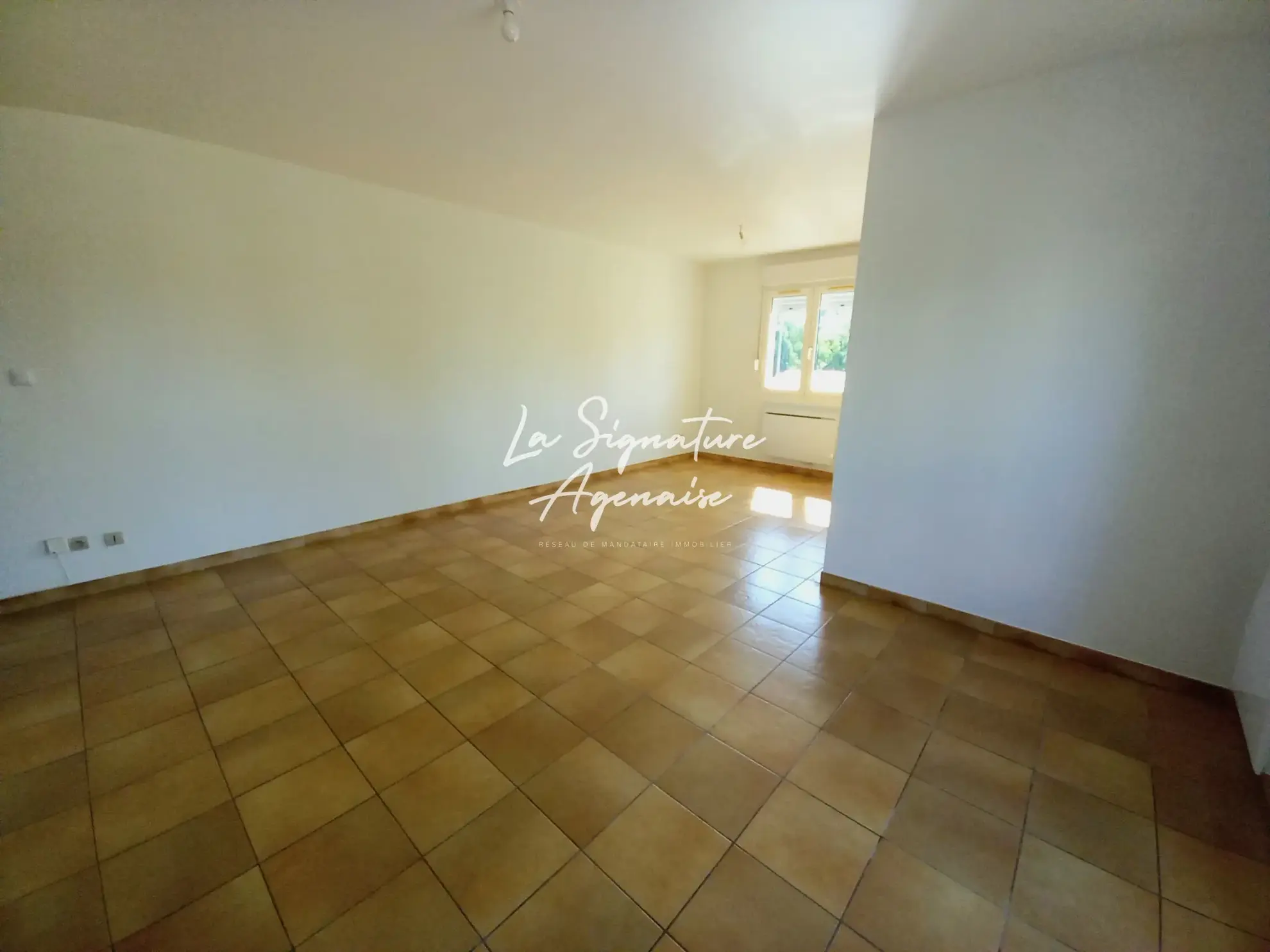 Appartement T2 avec garage au Passage, 58 m², proche commodités 