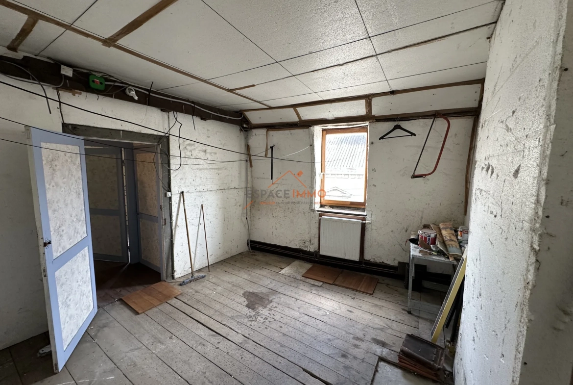 Maison à rénover avec 4 chambres au centre d'Anzin - Opportunité d'investissement 