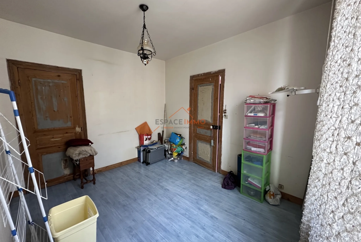 Maison à rénover avec 4 chambres au centre d'Anzin - Opportunité d'investissement 