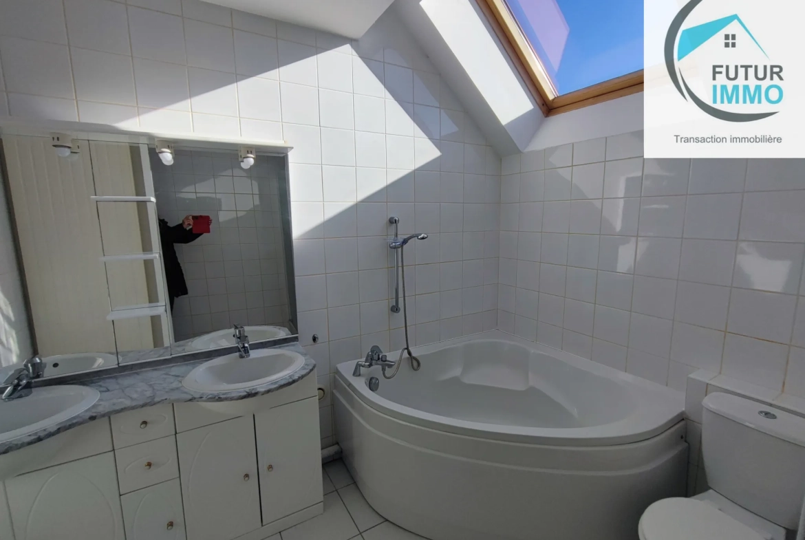 Maison 140 m² à Mathay avec jardin, garage et 4 chambres 