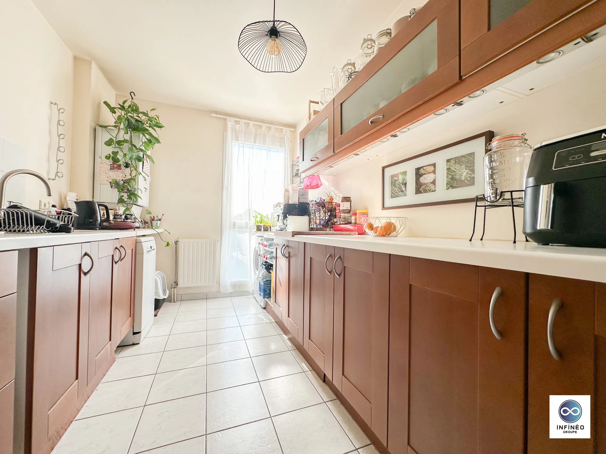 Appartement 4 pièces avec balcon et box à Sainte-Geneviève-des-Bois 