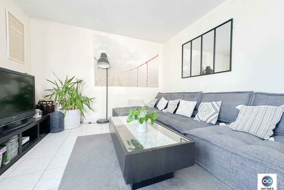 Appartement 4 pièces avec balcon et box à Sainte-Geneviève-des-Bois 