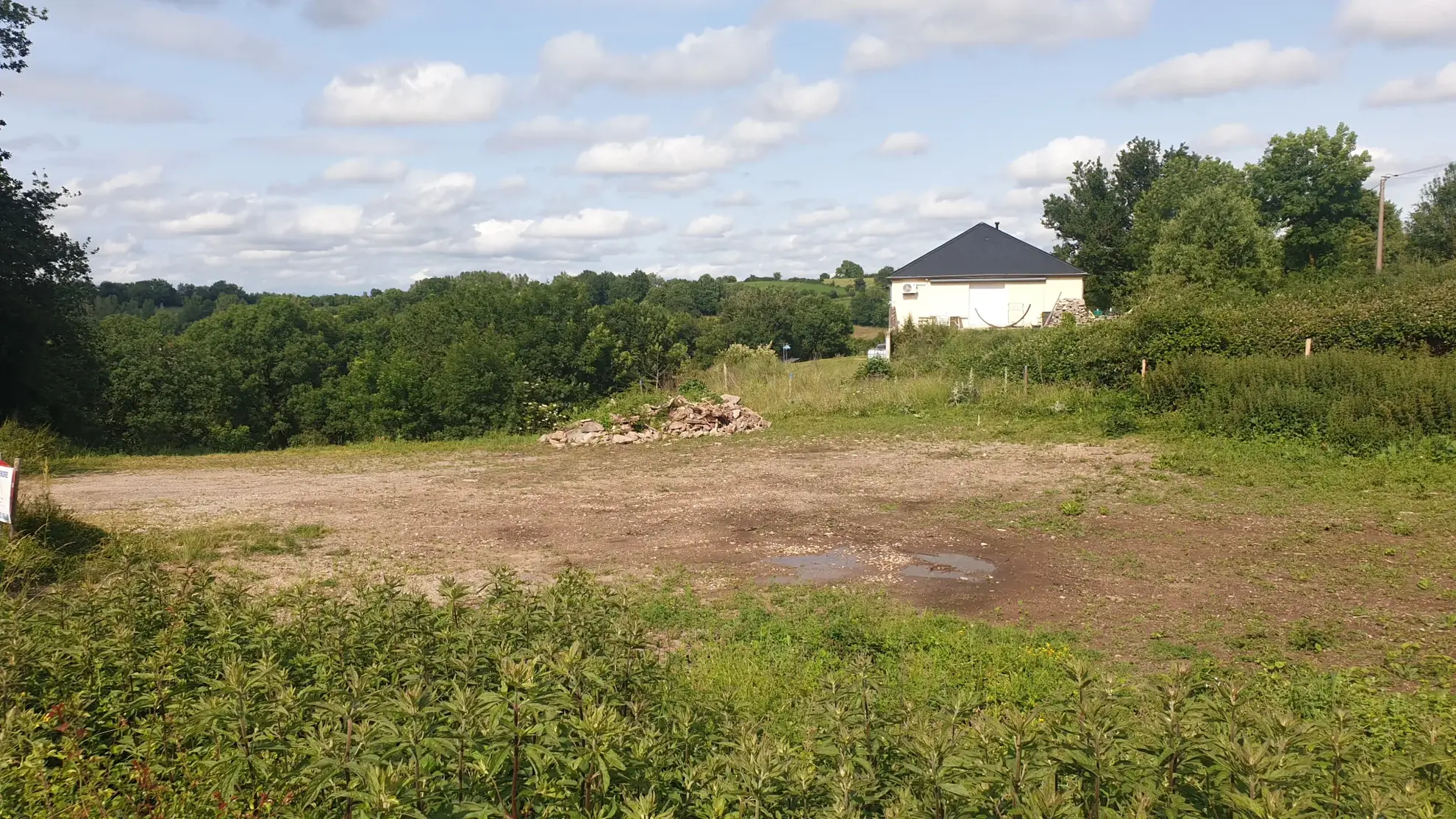 Terrain à bâtir à Druelle avec vue panoramique, idéal pour votre projet immobilier 