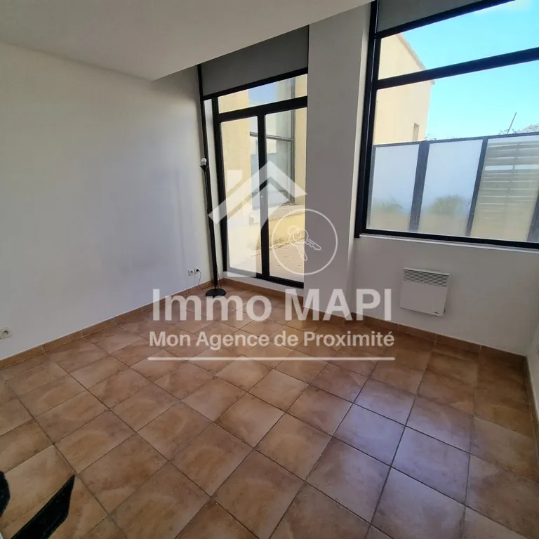 Appartement T3 de 58m² avec terrasse à Montpellier dans résidence historique avec garage 
