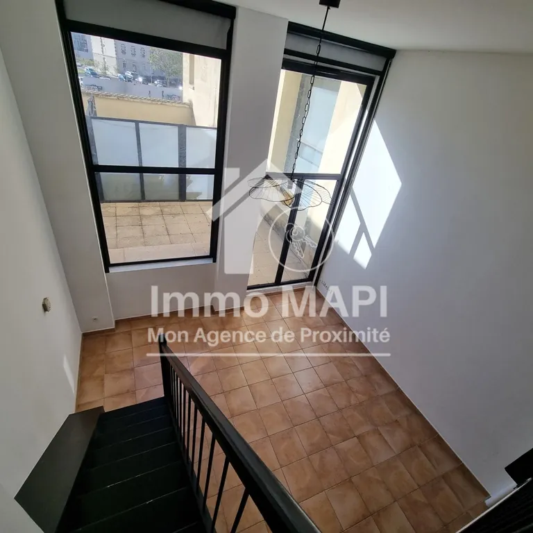 Appartement T3 de 58m² avec terrasse à Montpellier dans résidence historique avec garage 